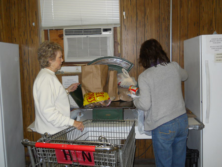 Volunteers fulfilling client order
